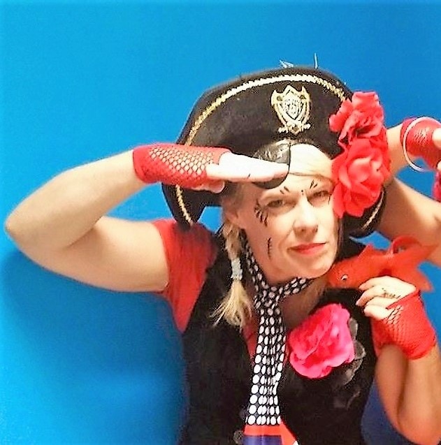 fullsizerender-002 A woman in a pirate garment.