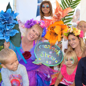 Fairy Photbooth A group of children posing for a photo.