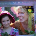 A woman and a child in a frame.